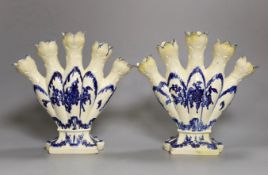 A pair of early 19th century Dutch Delft blue and white tulip vases, 22cm tall