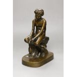 An early 20th century bronze figure of a fisherboy, 25cm