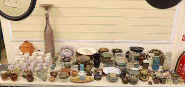 A large quantity of Susan Threadgold tall pottery bottle vase, eggcups, bowls, plates, vases etc,