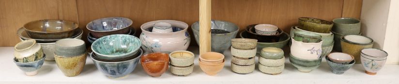A large quantity of British studio pottery bowls and dishes, to include a vast amount by Susan