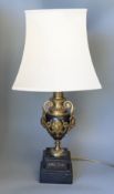 A gilt metal mounted lamp