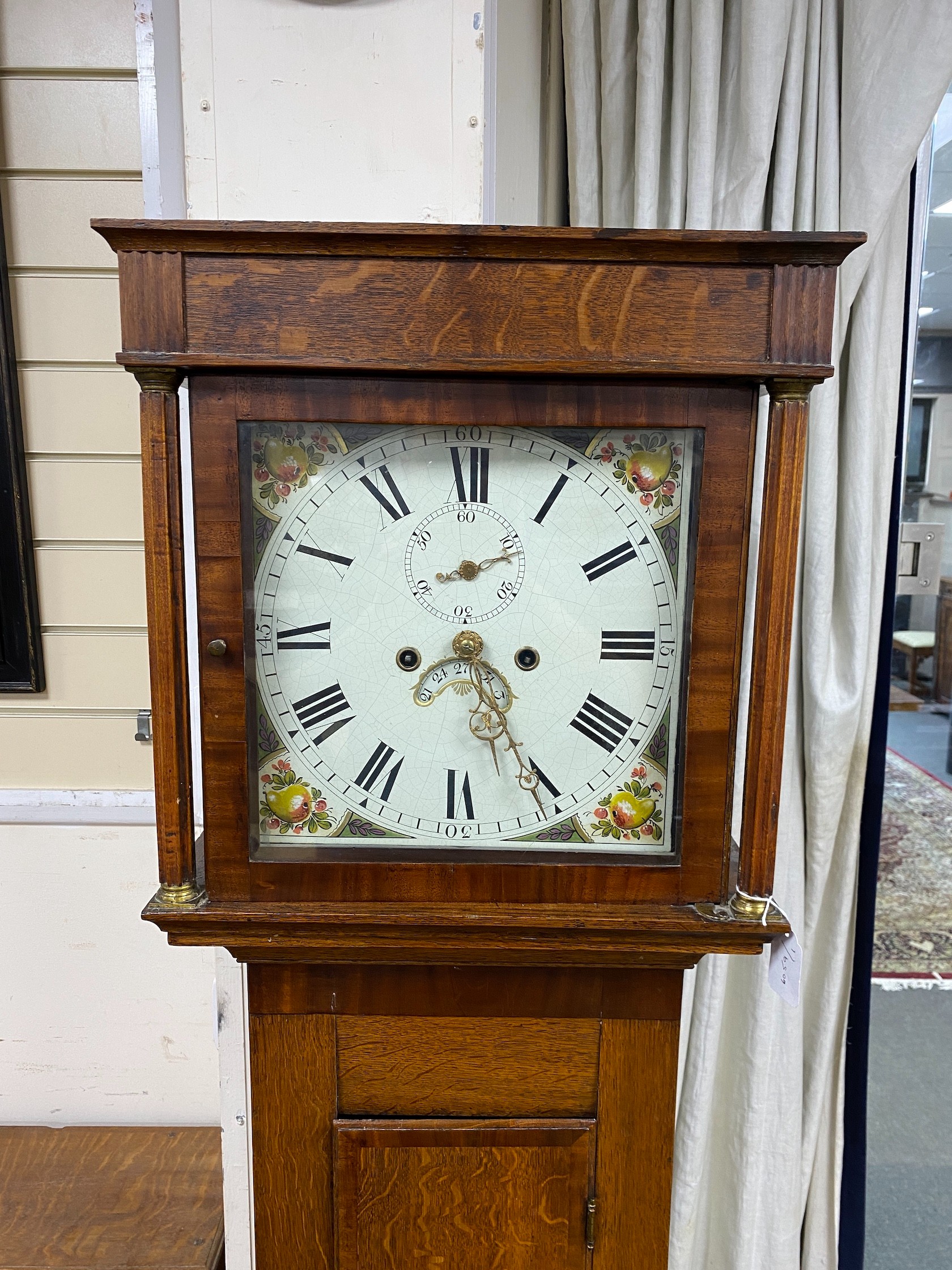 An early 19th century eight day longcase clock with painted dial, height 185cm