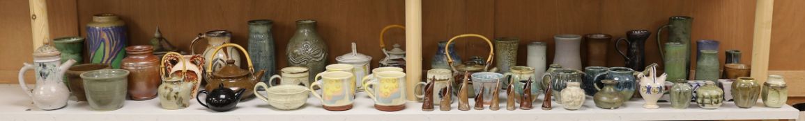 A large quantity of British studio pottery teapots, mugs, jugs and other miscellaneous items, to