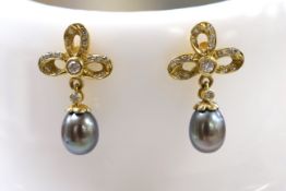 A modern pair of 750 yellow metal, Tahitian cultured pearl and diamond set drop earrings, 20mm,