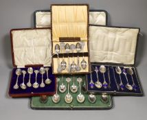 Rifle trophies: a cased set of twelve spoons, two cased sets of silver spoons and a cased set of six