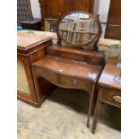 A George III style mahogany serpentine dressing table, width 72cm, depth 46cm, height 120cm