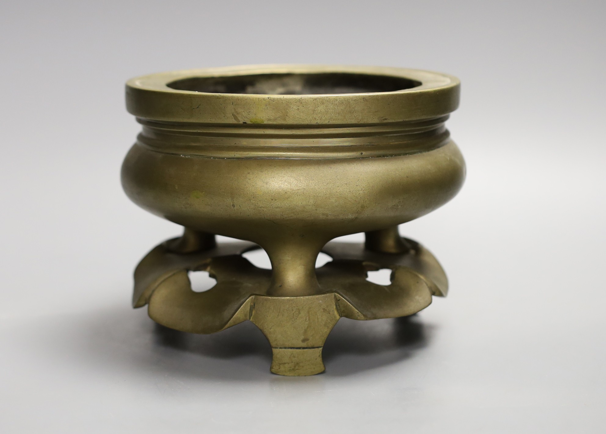 A Chinese bronze censer and stand, 13cm tall including stand