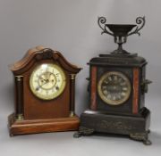 A 19th century slate urn mantel clock with lion feet, together with an American column mantle clock,