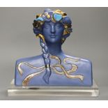 A limited edition blue glazed ceramic bust, signed A.Carreno, 197/500, 29cm tall