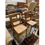 A set of four beech chapel chairs