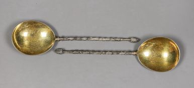 A pair of George V silver serving spoons, with ornate stems, Mappin & Webb, London, 1918/19, 19.6cm,