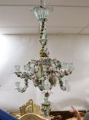 A 19th century continental floral encrusted porcelain nine branch chandelier, 77cm drop