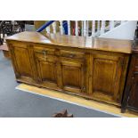 An 18th century style pale oak low dresser, length 190cm, depth 49cm, height 83cm