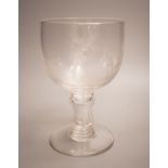 Golfing interest - a Victorian wheel engraved glass goblet, depicting two golfers, height 23cm