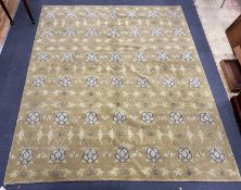 An Arts and Crafts style pale green ground carpet, 300 x 250cm