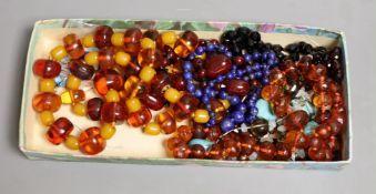 A group of assorted amber and other bead necklaces