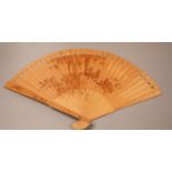 A Chinese penwork sandalwood fan