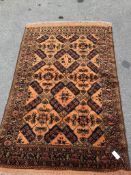An Afghan gold ground rug, 186 x 124cm