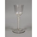 An 18th century double series opaque twist stem wine glass, 16cm tall