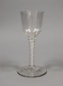 An 18th century double series opaque twist stem wine glass, 16cm tall