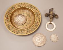 A brass tray, various coins and a rattle dish, 11.5cm diameter