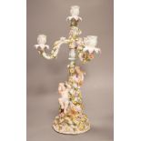 A Sitzendorf porcelain three branch, four light candelabrum, 45cm