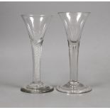 Two 18th century drawn trumpet wine glasses, one with air twist stem, tallest 15.5cm