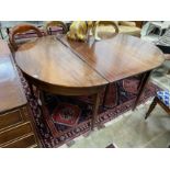 A George III mahogany D end extending dining table with later drop leaf, 180cm extended, depth