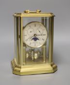 A four glass Sewills 400 day clock, 20cm high.