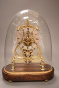A 19th-century brass single fusee skeleton timepiece under dome, with wall bracket