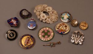 A selection of badges, to include Suffragette Women's Social and Political Union ‘Votes For