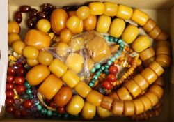 A group of assorted bead necklaces including amber