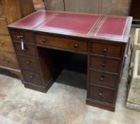 A George III style mahogany kneehole desk with hinged central section, width 104cm, depth 55cm,