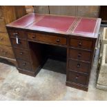 A George III style mahogany kneehole desk with hinged central section, width 104cm, depth 55cm,