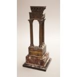 A late 19th century Grand Tour style bronze, temple ruins ‘Estitver’ on marble base, total height