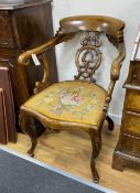A Victorian carved walnut elbow chair, width 58cm, depth 48cm, height 90cm