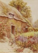 M. Brabin, watercolour, Cottage and flower garden, signed and dated '36, 37 x 26cm