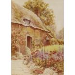 M. Brabin, watercolour, Cottage and flower garden, signed and dated '36, 37 x 26cm