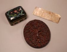A Chinese cloisonne box, a lacquer carving and a mother of pearl counter