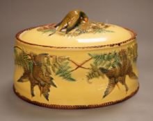A Continental majolica game tureen with floral and bird relief, 18cm tall