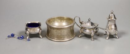 A George V silver jubilee commemorative trencher salt, London 1935, 5oz, and a three piece plated
