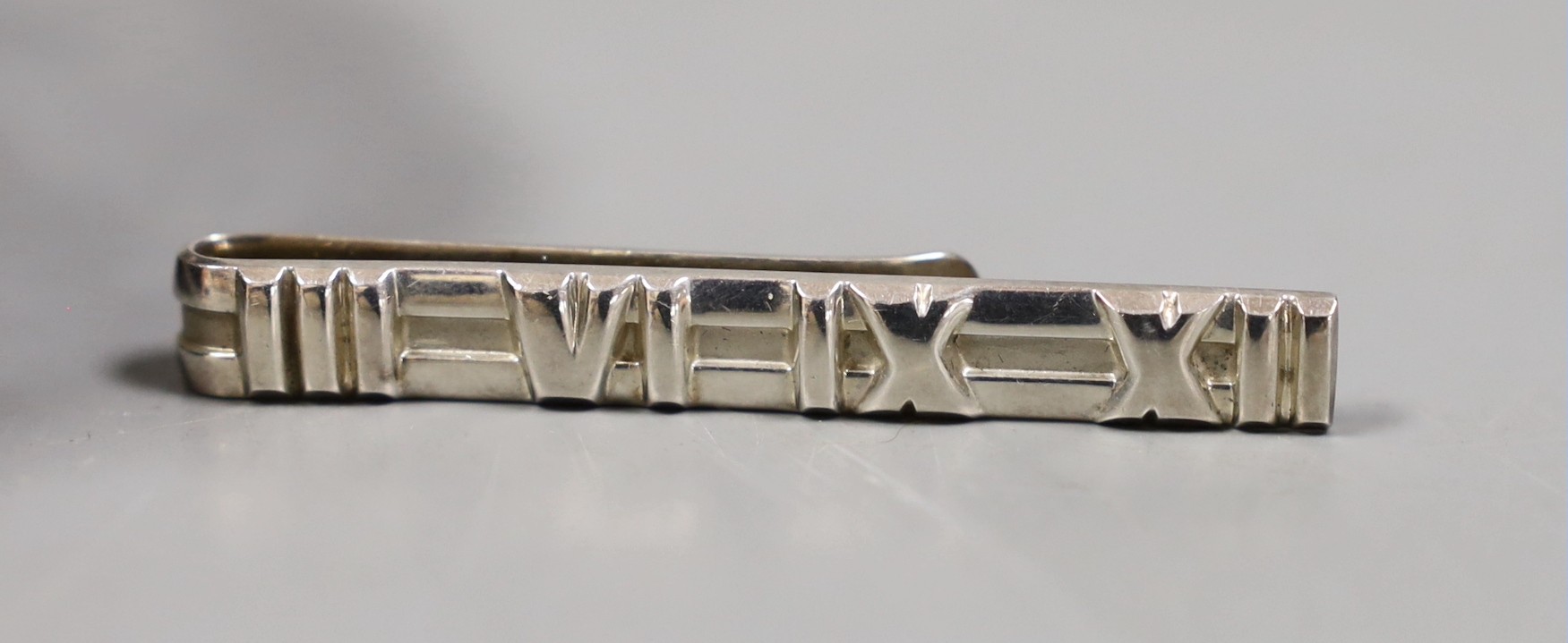 A Tiffany & Co 925 standard tie clip, 5cm and an Edwardian pierced silver dish, 11cm - Image 2 of 3