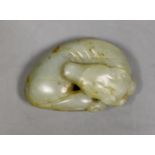 A Chinese jade carving of a sleeping dog, 6cm wide