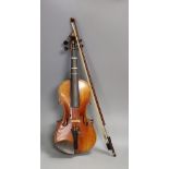 A quarter size late 19th century violin with bow, in E. Hill & Sons case, back measures 29cm Ivory