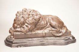 After Isadore Bonheur a bronze figure of a recumbent lion, on marble base, 20th century, 35cm