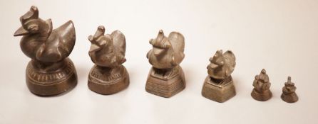 Six Burmese bronze duck opium weights, tallest 7cm