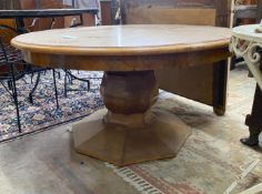 An Art Deco style circular figured walnut low centre table, diameter 120cm, height 62cm