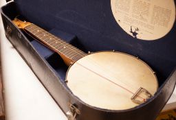 A ukelele banjo in case