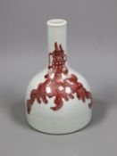 A Chinese underglaze copper red ’dragon’ bottle vase, 18cm tall
