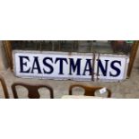 A large 'Eastmans' enamel butcher's advertising sign, length 216cm, height 56cm